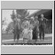 Family in front of cobblestone house 1924.jpg